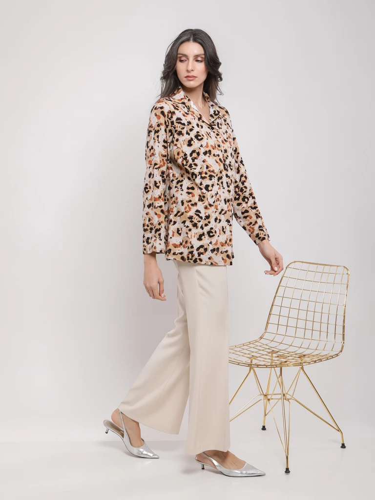 Pantalon flare à boutons dorés