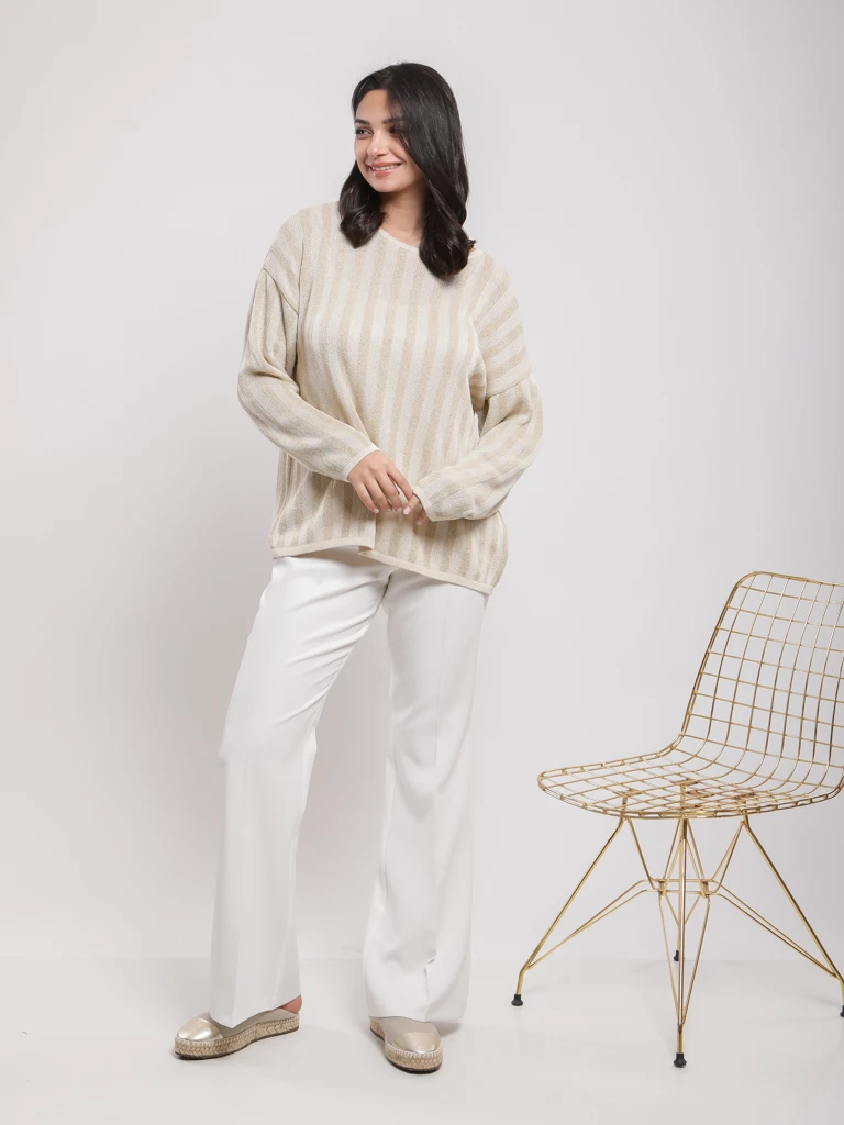 Pantalon flare à boutons dorés