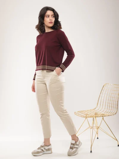 Pull en maille à rayures dorées